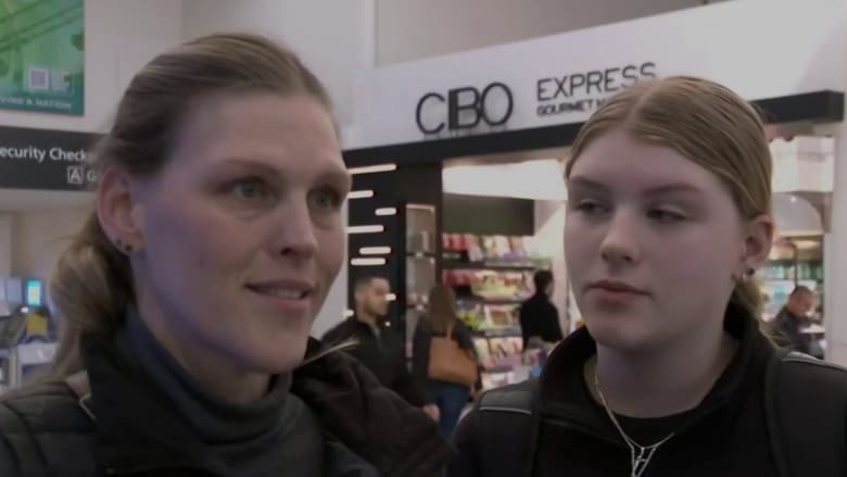 Passengers arriving at Reagan National Airport react to deadly crash