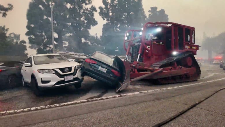 Bulldozer moves cars blocking Palisades Fire escape route
