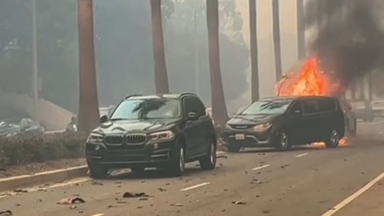 Vehicle catches fire while stuck in traffic near Palisades Fire