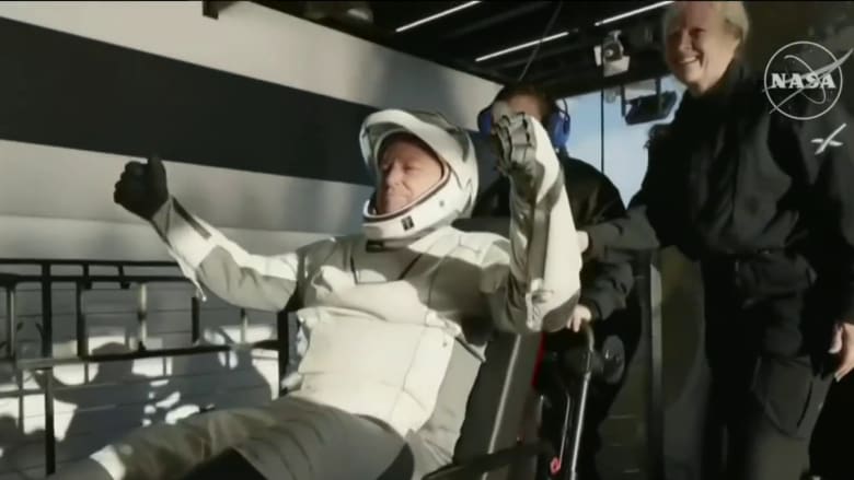 NASA astronauts emerge from SpaceX dragon