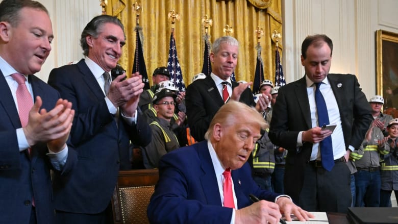 Trump signs order to boost coal projects and end federal restrictions