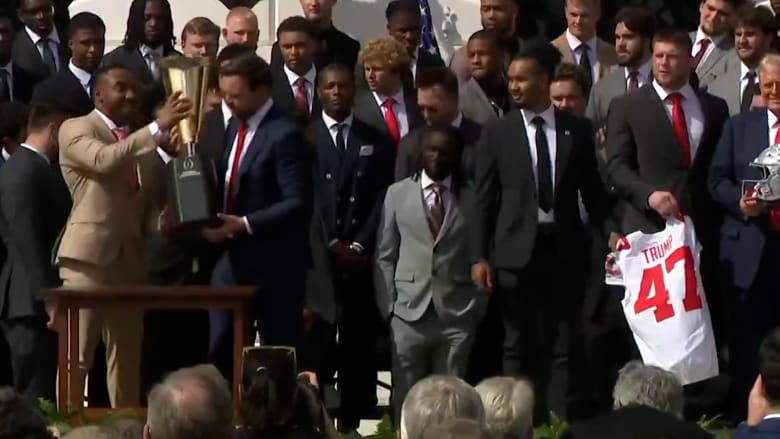 Ohio State football trophy breaks in two as Vance lifts it at White House event