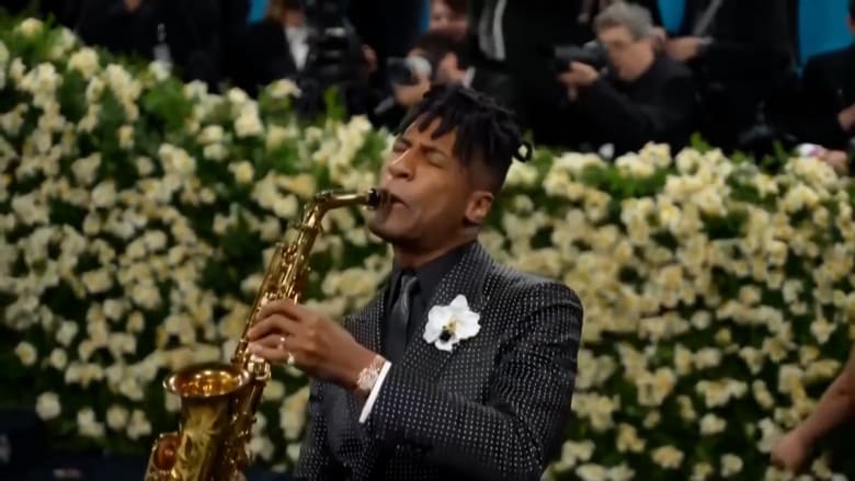 Jon Batiste brings his musical flair to Met Gala 2025