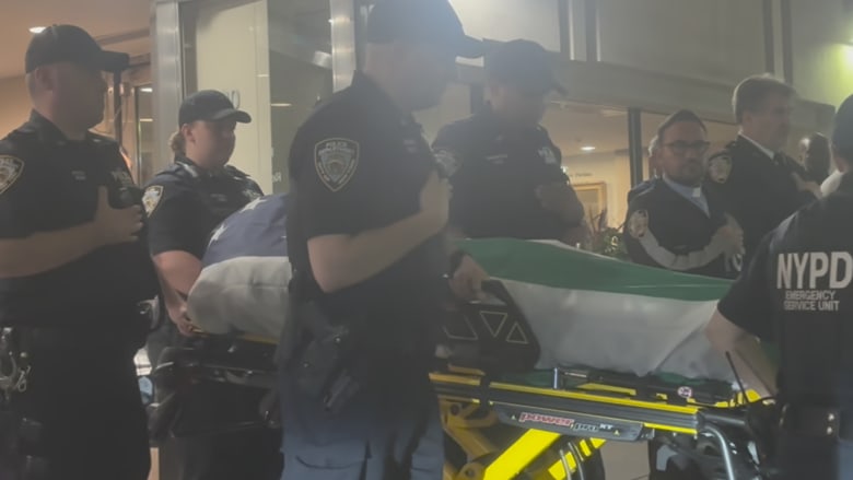 Officer killed in New York City office shooting honored with dignified transfer