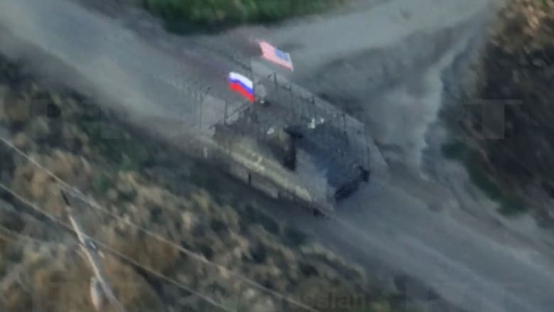 Russian state media shares video of vehicle flying U.S. and Russian flags in Ukraine