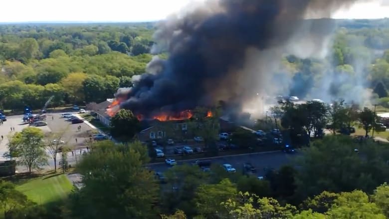 Drone video shows Michigan church on fire after shooting