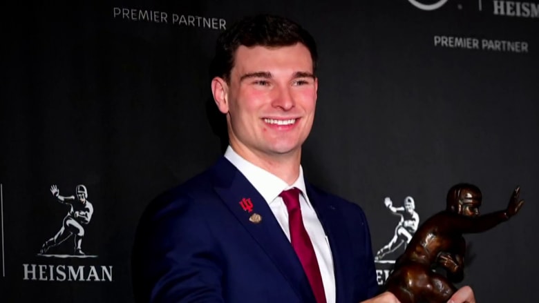 Heisman Trophy winner’s emotional tribute to his family