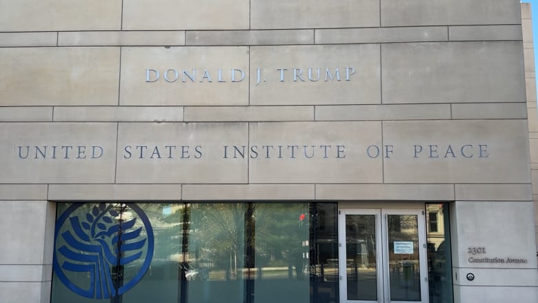 Trump's name added to Institute of Peace building sign