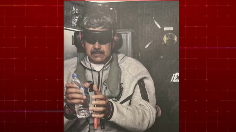 Trump posts photo appearing to show Maduro in U.S. custody