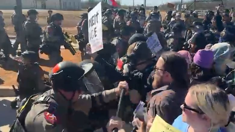 Texas troopers launch canisters at protesters outside detention center