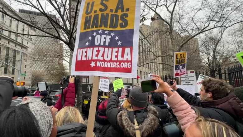 Demonstrators protest outside New York courthouse before Maduro arraignment