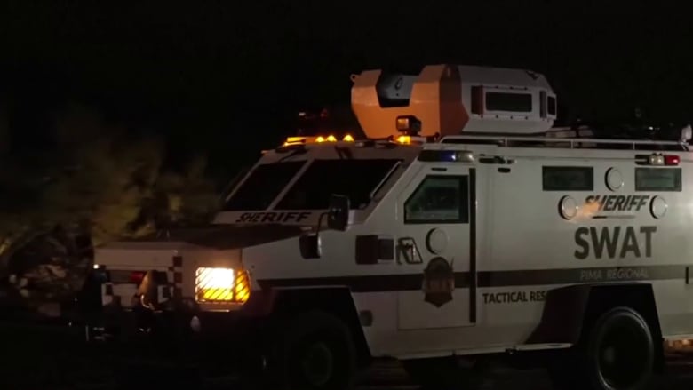 Law enforcement activity happening in Nancy Guthrie's neighborhood