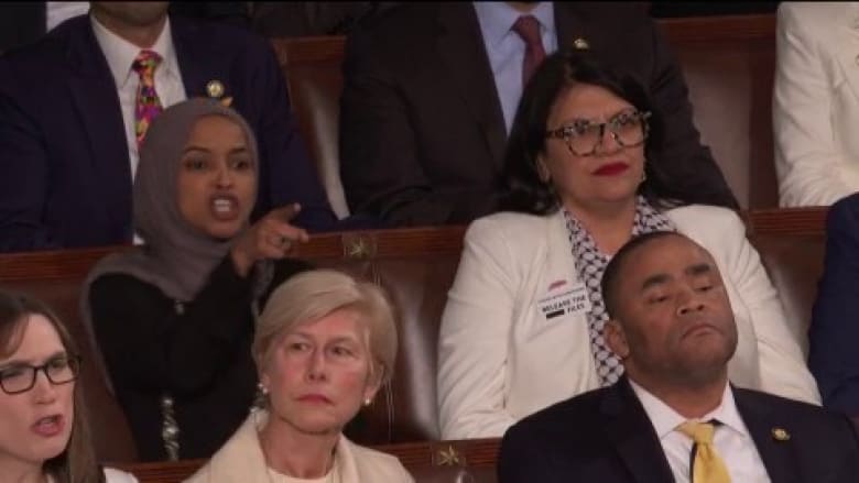 Watch: Lawmakers stand in support of immigration enforcement while others shout