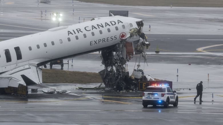 One runway reopens at LaGuardia Airport after fatal collision 