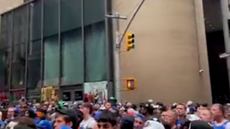 Crowds wait for the Knicks parade to begin in downtown Manhattan