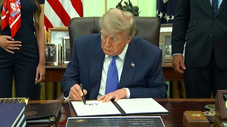 Trump signs executive order on childhood vaccines