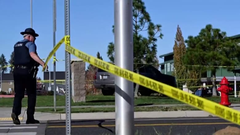 16-year-old suspect used long gun to shoot at school's locked doors, police say