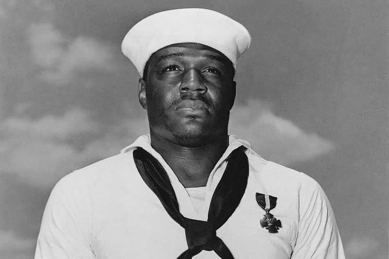 Doris Miller, who was the first African-American sailor to receive the Navy Cross for his bravery during the Japanese attack on Pearl Harbor.