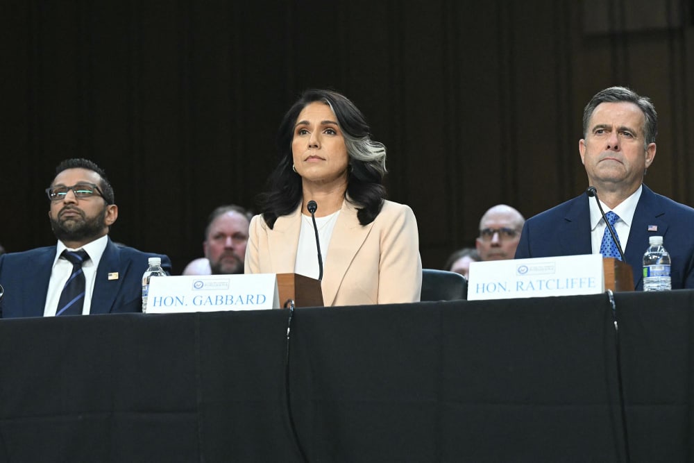 From left, FBI Director Kash Patel, Director of National Intelligence, Tulsi Gabbard and CIA Director John Ratcliffe arrive to testify before the Senate Intelligence Committee on March 25, 2025. 