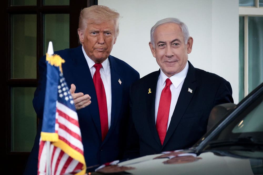 President Donald Trump greets Israeli Prime Minister Benjamin Netanyahu as he arrives at the White House on April 7, 2025.