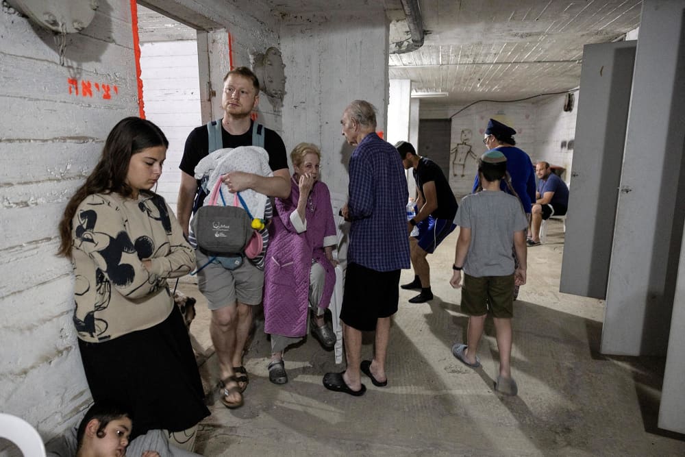 Israelis gather in a shelter following sirens in Tel Aviv June 13, 2025.