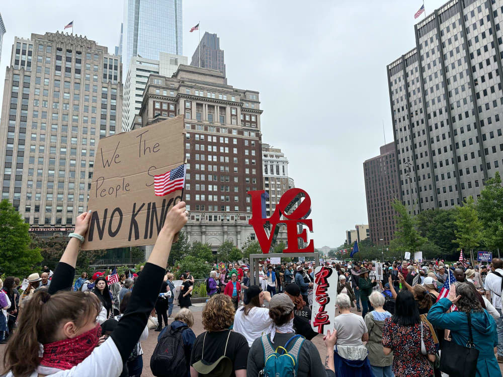 A crowd gathers at Love Park in Philadelphia for a "No Kings" rally.