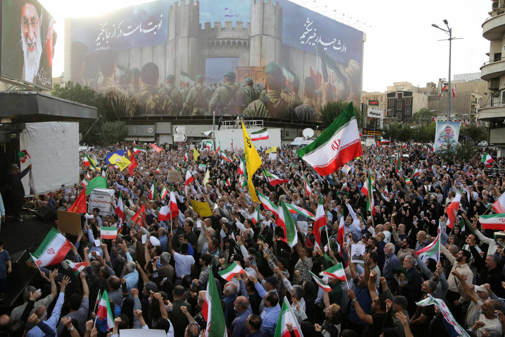 Iranians gather at the Revolution Square in Tehran to protest US attacks