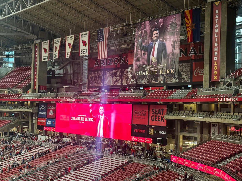 State Farm Stadium stands begin to fill up with people