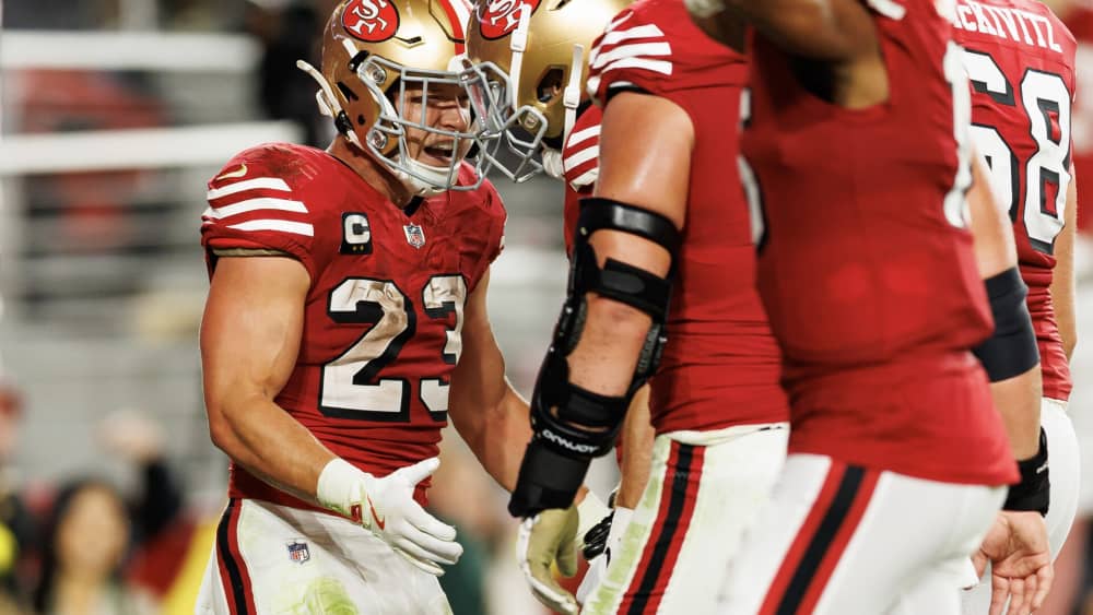 SANTA CLARA, CALIFORNIA - OCTOBER 19: Christian McCaffrey #23 of the San Francisco 49ers celebrates with teammates after scoring a touchdown during the second half of an NFL football game against the Atlanta Falcons at Levi's Stadium on October 19, 2025 in Santa Clara, California. (Photo by Brooke Sutton/Getty Images)