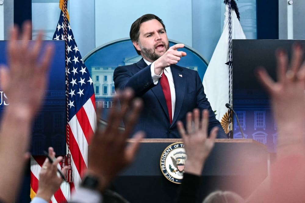 internet investigation internet investigation JD Vance speaks at a podium as of us elevate their hands in the viewers