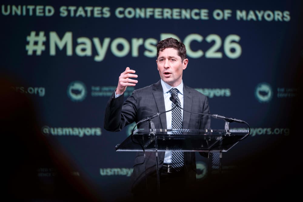 Jacob Frey speaks at a podium