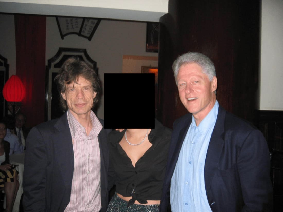 Mick Jagger and Bill Clinton appear in an undated photo released by the