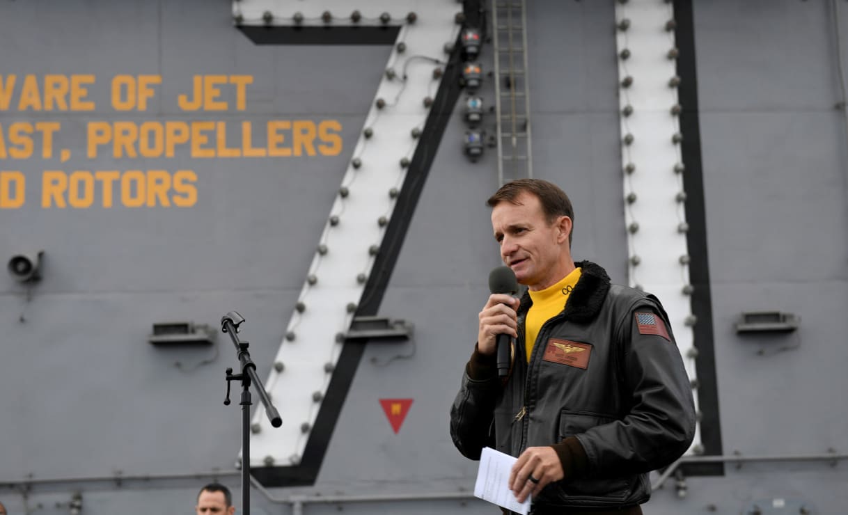 Captain Brett Crozier, commanding officer of the U.S. Navy aircraft carrier USS Theodore Roosevelt, speaks at sea