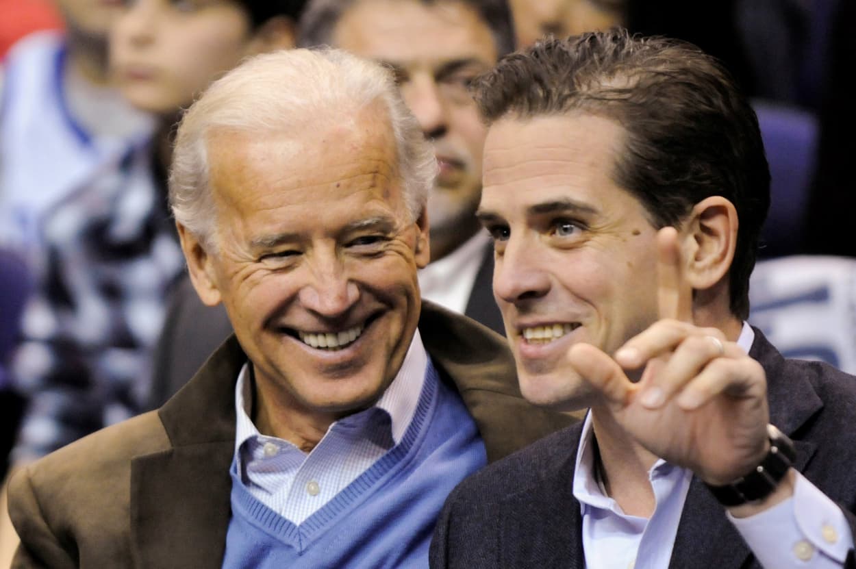 Image: Vice President Joe Biden and his son Hunter Biden attend an NCAA basketball game between Georgetown University and Duke University in Washington.