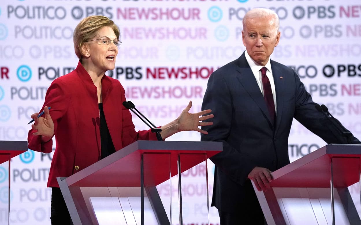 Image: Democratic U.S. presidential candidate Senator Elizabeth Warren speaks with former Vice President Joe Biden listening during the sixth Democratic presidential candidates campaign debate at Loyola Marymount University in Los Angeles