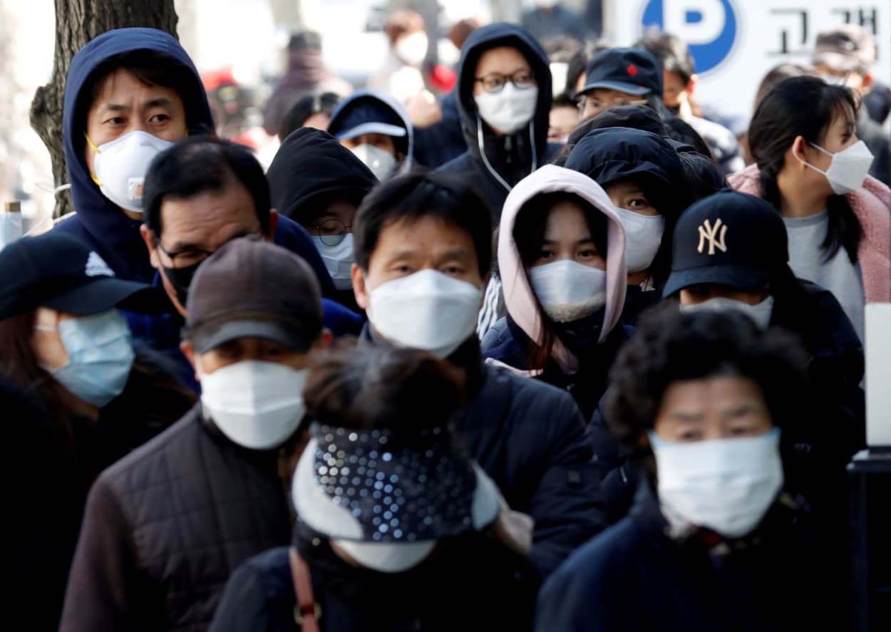 Image: People stand in a long queue to buy face masks at a post office, after a shortage of masks amid the rise in confirmed cases of the novel coronavirus disease COVID-19, in Daegu, South Korea