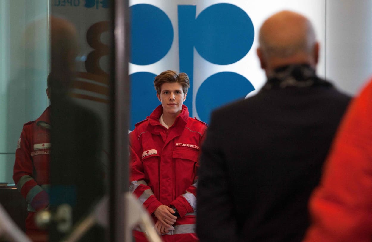 Image: Red Cross medics check the temperature of participants of the 178th Organization of Petroleum Exporting Countries (OPEC) meeting in Vienna, Austria