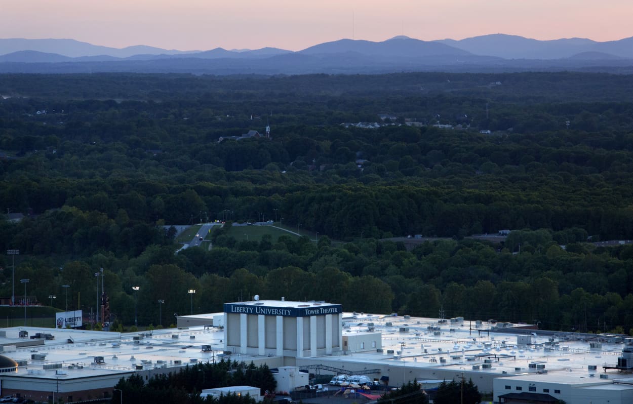 Image: The sun sets over the Liberty University campus in Lynchburg, Va., on May 3, 2017.