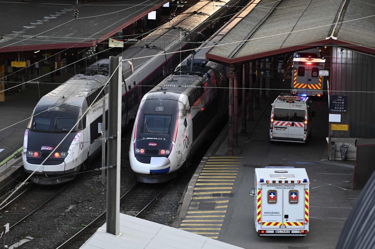 Image: Ambulances stand by to pick up coronavirus patients from a high-speed train in Strasbourg, France on Thursday.