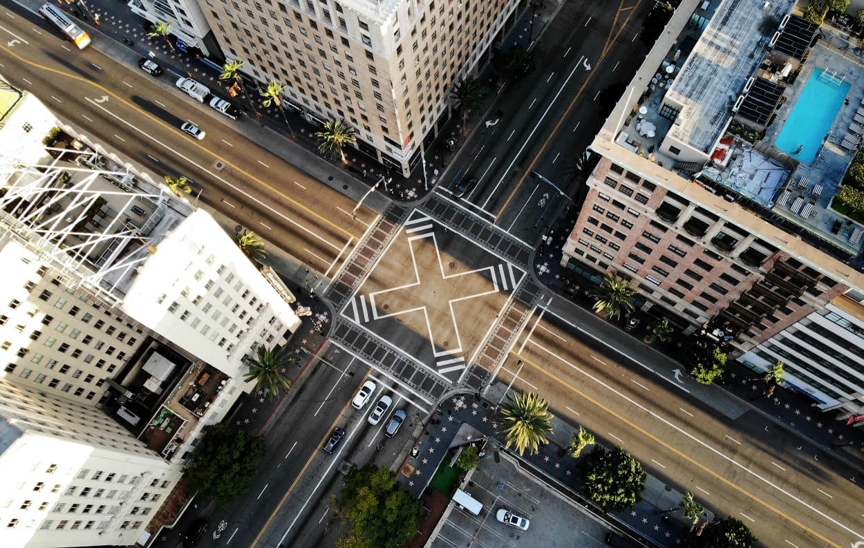 Image: The nearly empty intersection of Hollywood and Vine in Los Angeles on March 25, 2020. California Governor Gavin Newsom issued a stay at home order for residences to slow the spread of coronavirus.