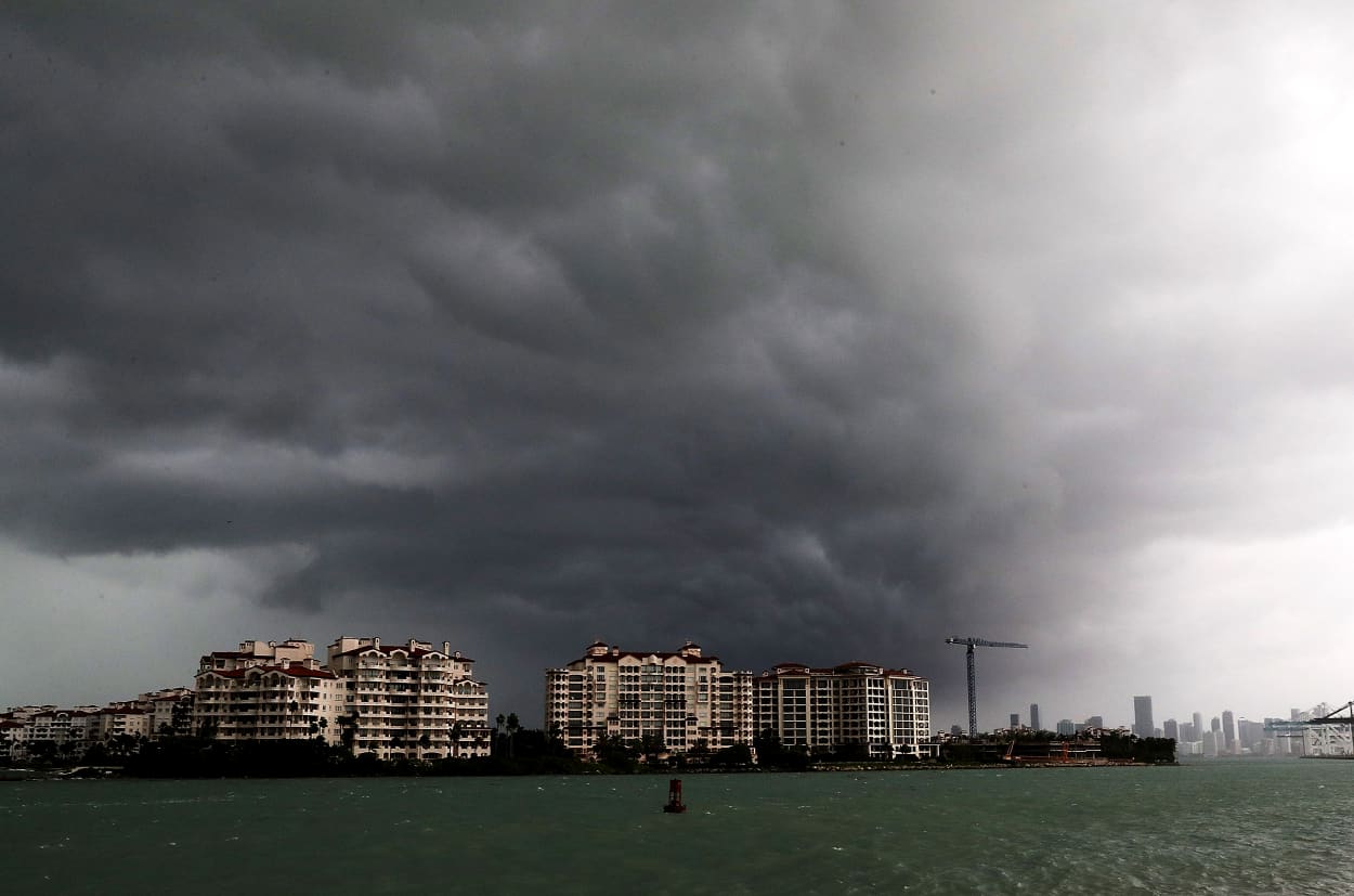 Image: Storm clouds approach Fisher Island off the coast of Miami Beach in 2017.