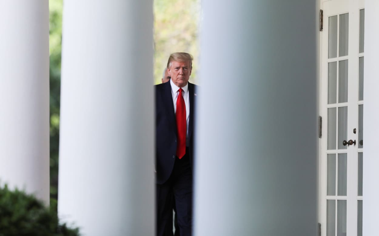 Image: U.S. President Trump arrives for coronavirus response news conference at the White House in Washington