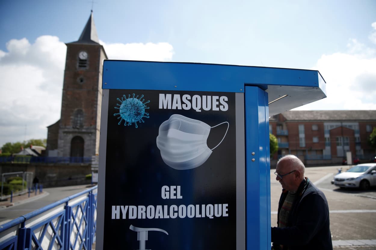 Image: A vending machine in a square in the French city of Jeumont sells protective face masks, hand sanitizer and gloves on Wednesday.