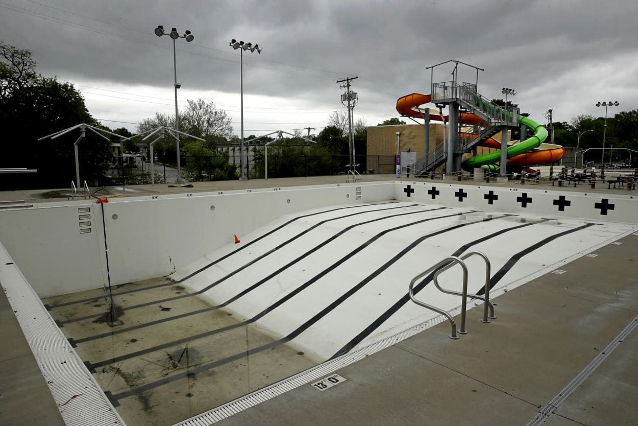 Image: A closed public pool in Mission, Kan., on May 15, 2020.