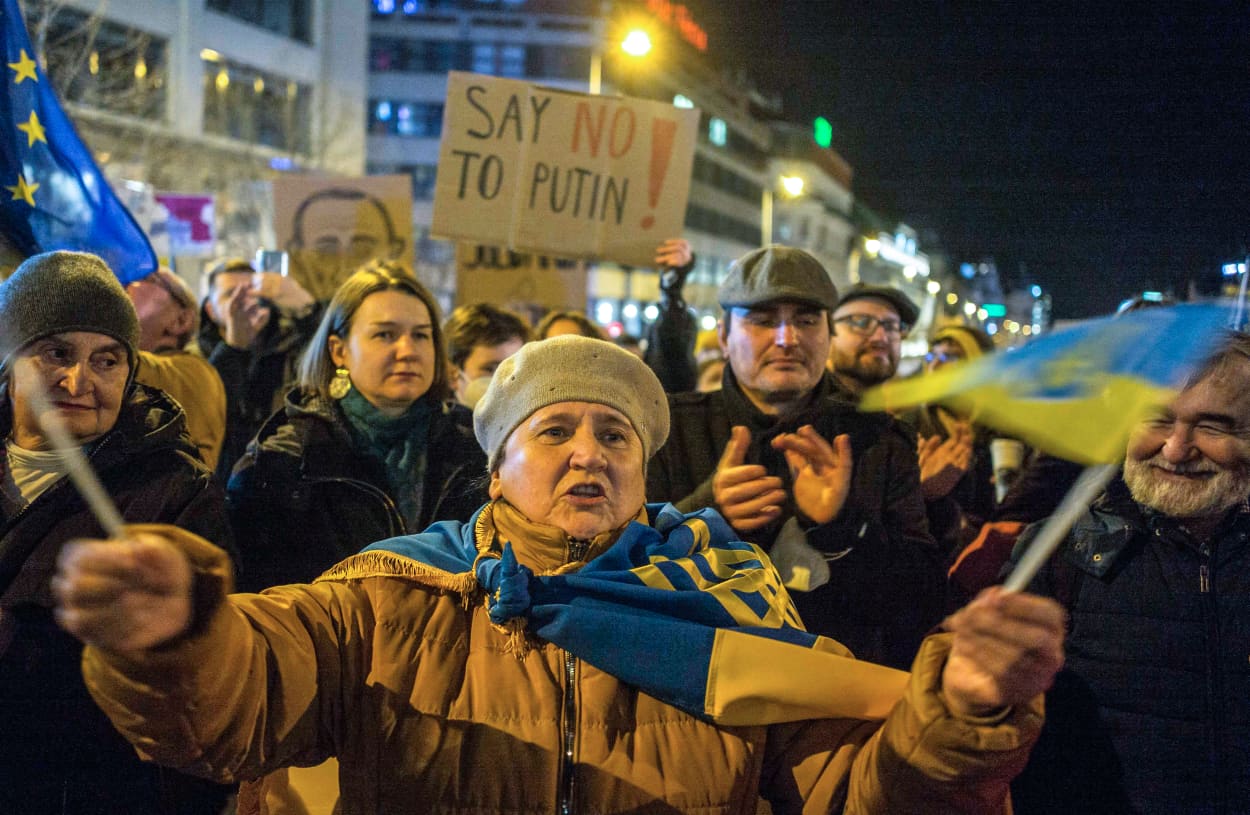 Image: Pro-Ukraine demonstrators display placards and Ukrainian flags Tuesday during a demonstration in support of Ukraine at the Wenceslas Square in Prague.