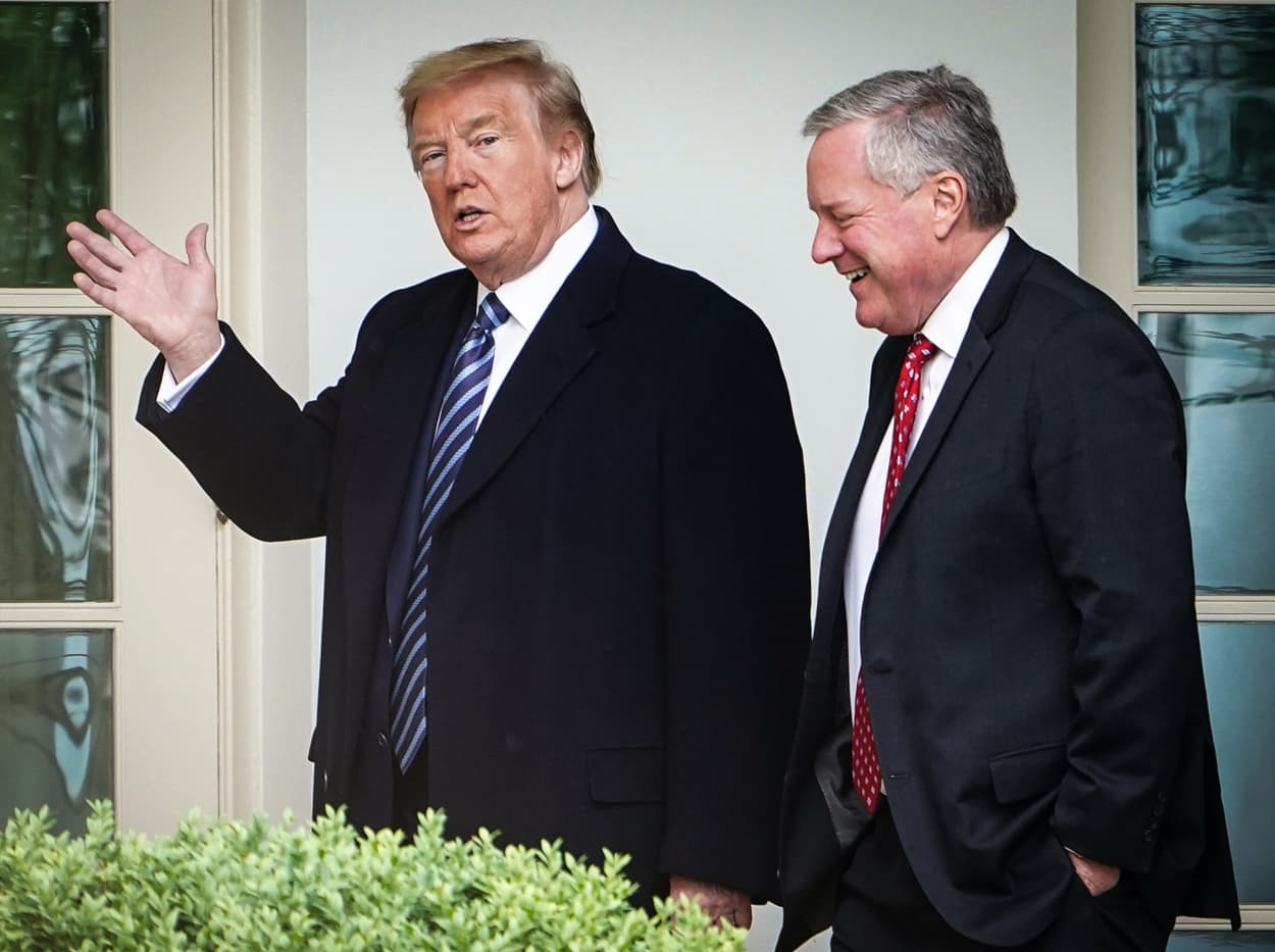 President Donald Trump walks with Chief of Staff Mark Meadows after returning to the White House from an event at the WWII memorial on May 8, 2020.