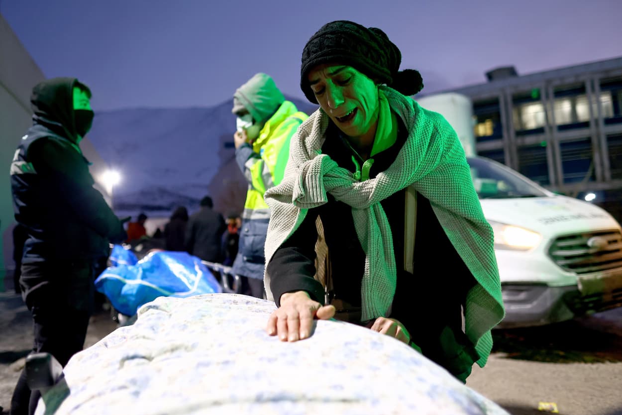 A woman mourns at the body of her niece outside the Elbistan State Hospital in Kahramanmaras, southeastern Turkey, on Feb. 8, 2023. 