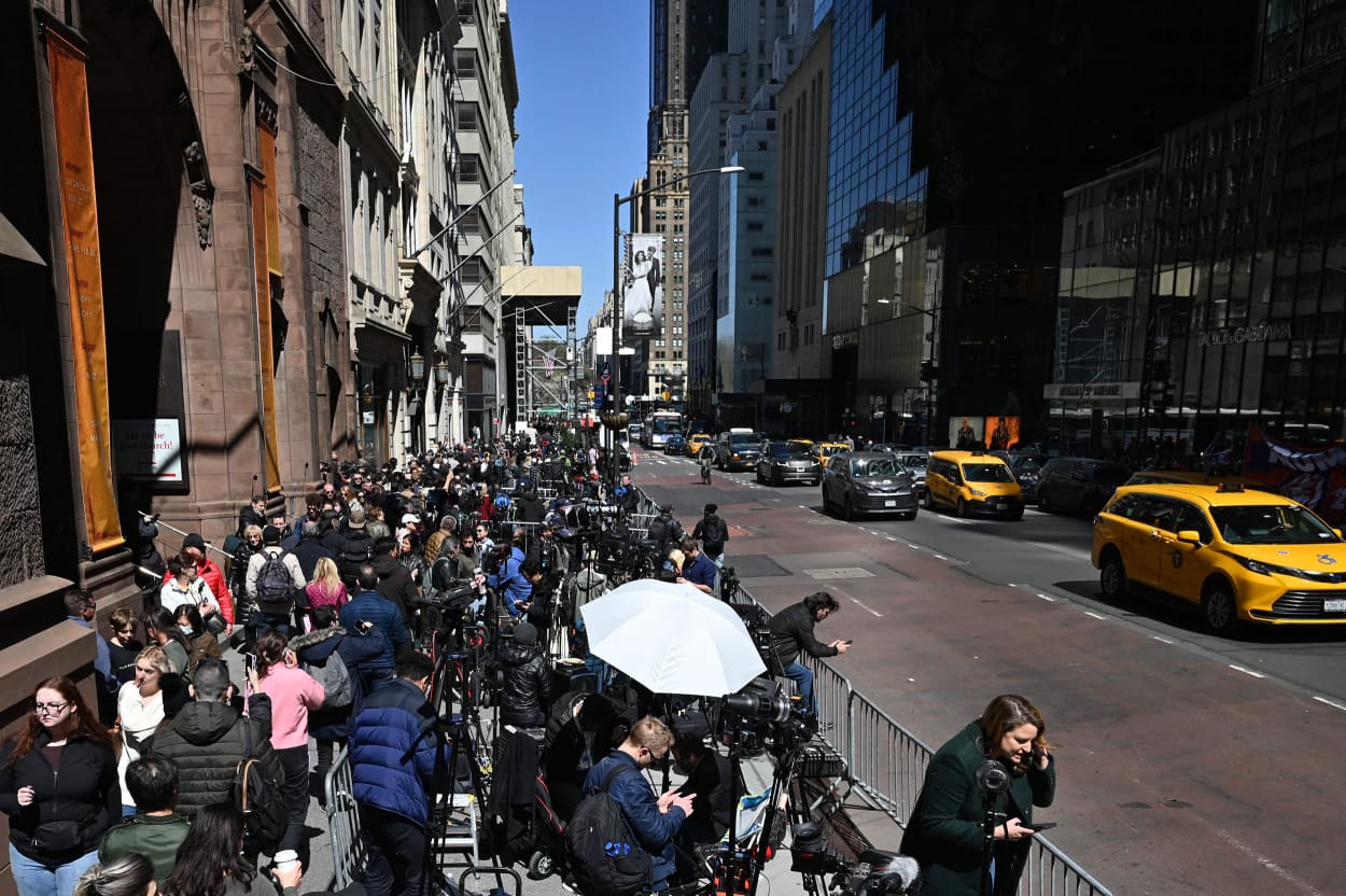 Journalists gather outside of Trump Tower in New York on April 3, 2023. 