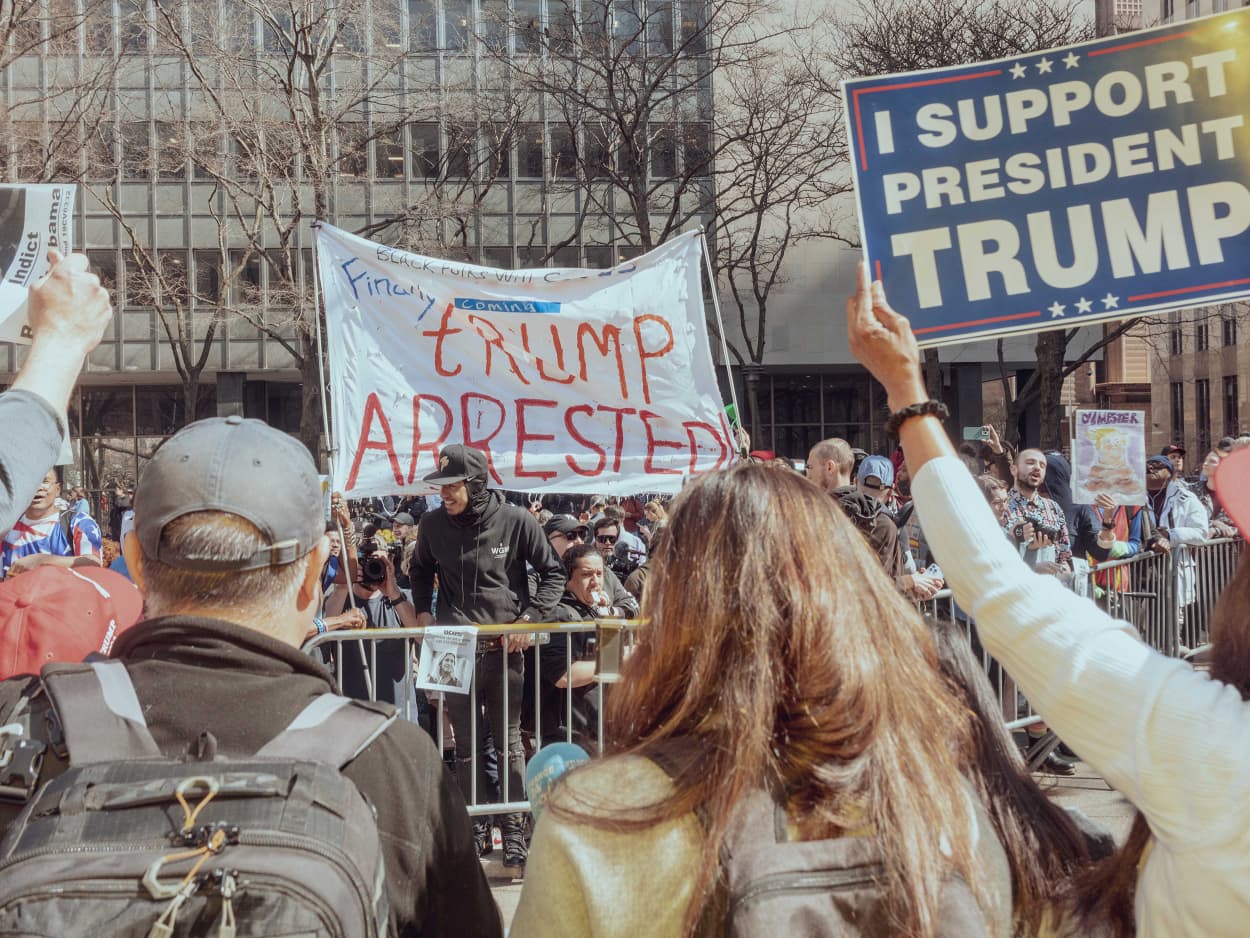 Supporters of former President Donald Trump and protestors during a rally outside criminal court in New York, US, on Tuesday, April 4, 2023.