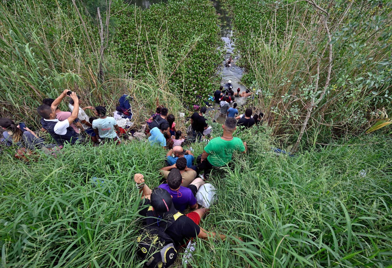 Migrants start crossing the Rio Grande to enter the U.S. in Matamoros, Mexico, on May 10, 2023.